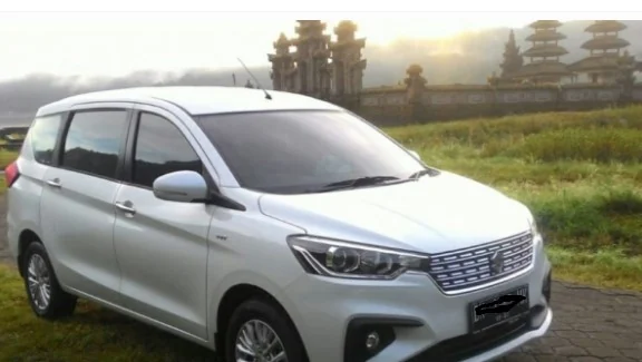 Suzuki All New Ertiga 2018 rental vehicle in Bali with a driver.
